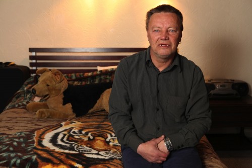 Chris in his bedroom, his favourite room in the house