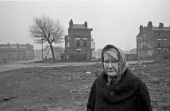 Woman amidst slum clearance, Liverpool 8, 1969 