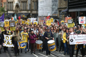 Protesters march against the rising cost of living in Manchester