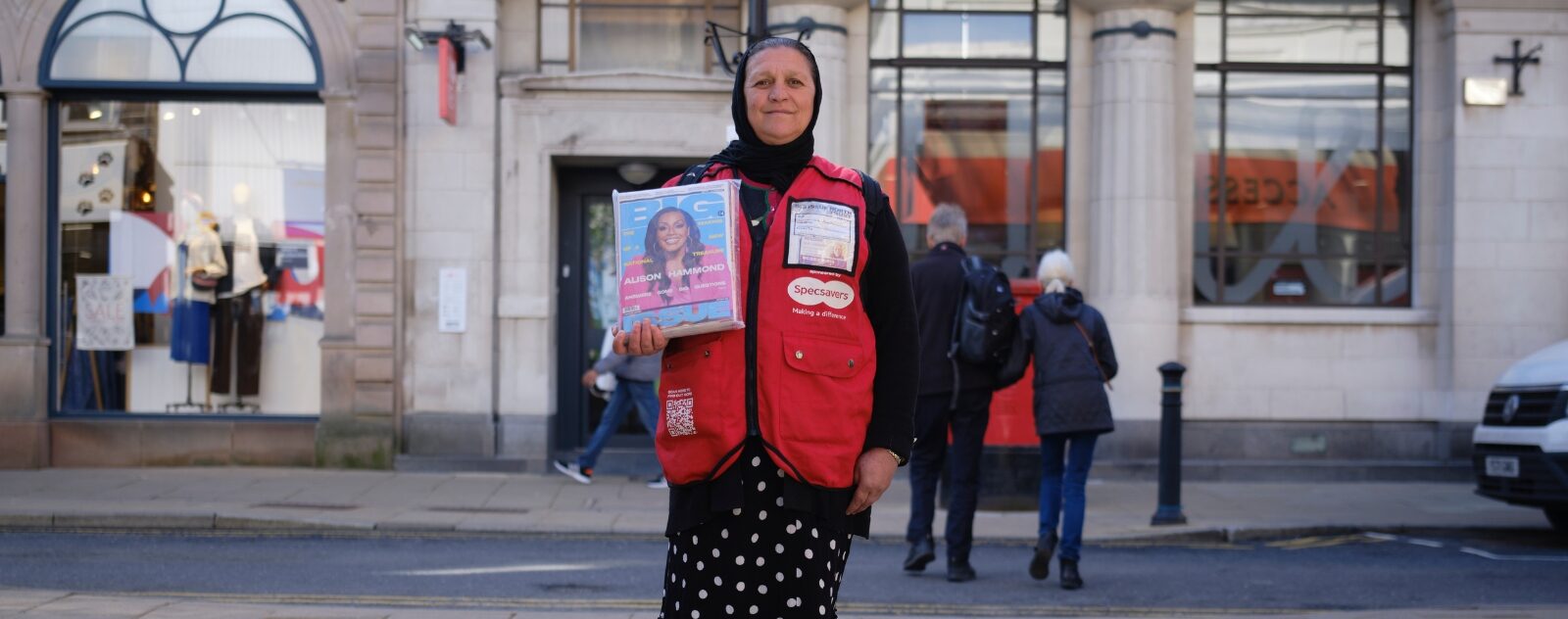 A woman at work: A Big Issue North vendor selling the magazine